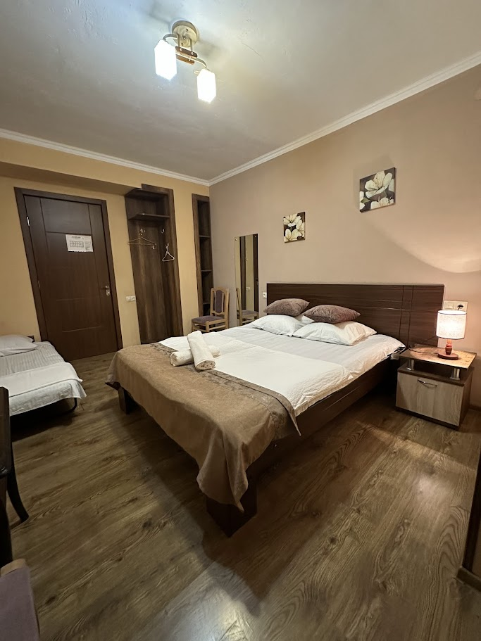 Family room at Guest House Kavkasioni 33 prepared for group stay